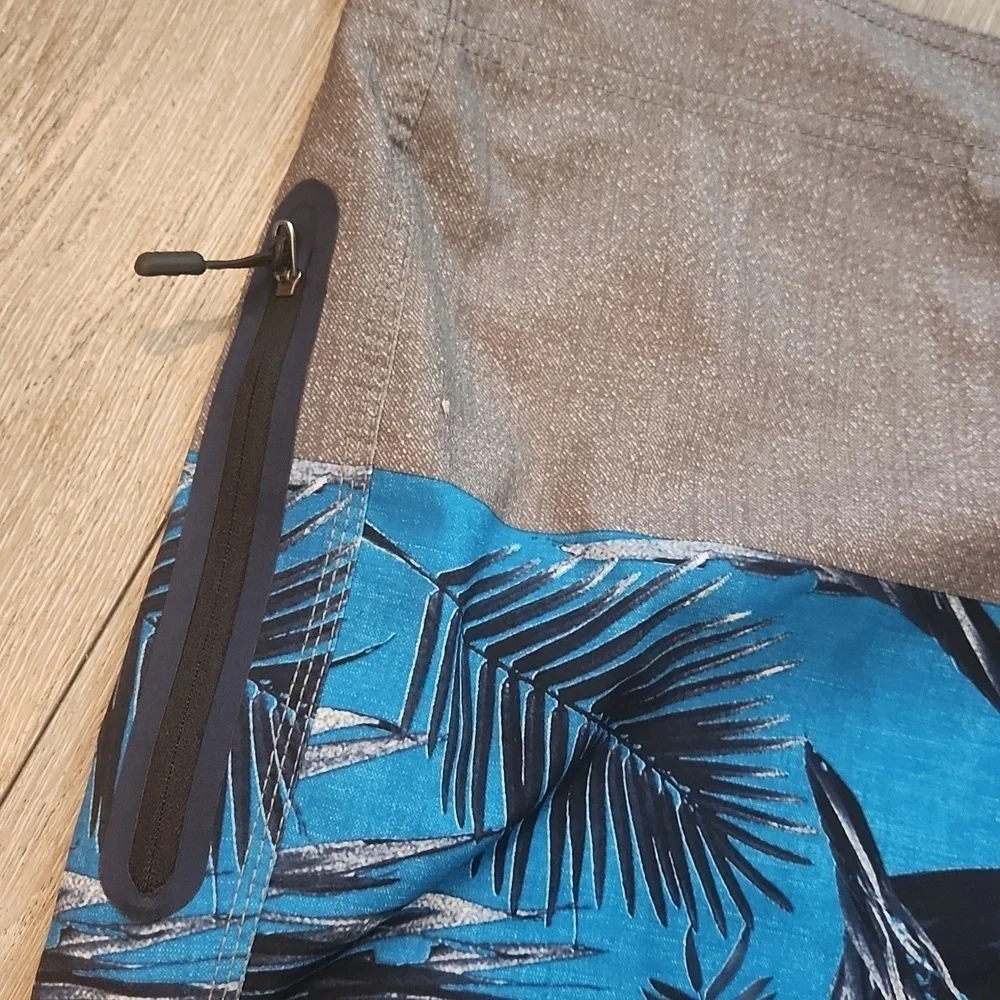 O'Neill Gray and Blue Board Shorts with Tropical Print